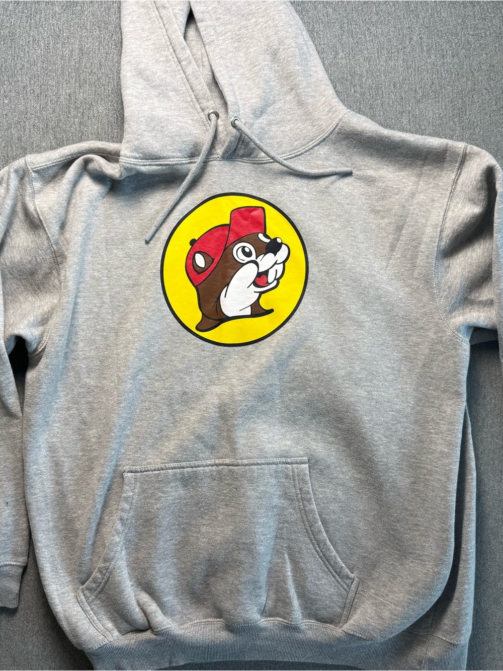 Buc-ee’s Gray Hoodie with Yellow Circle Mascot Graphic